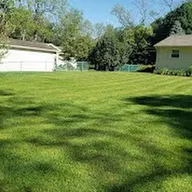 White's lawn care logo