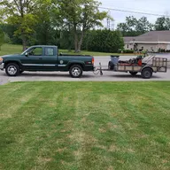 Neerings Lawn Maintenance logo