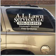 Van slykes Lawn care logo