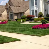 Kris's Lawn Care & Snow Removal logo