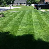 Burls Lawn Service logo
