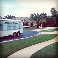 Theobald upkeep LLC. logo