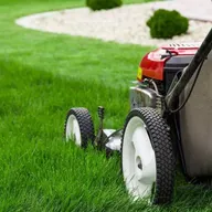We Kare Lawn Service Llc logo