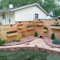 Bermudez Landscaping and snow removal logo