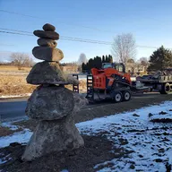 Michiana Boulders Landscaping and Excavating logo