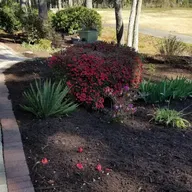 Vaught Landscaping logo