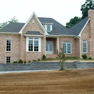WM Tucker Excavating & Landscaping logo