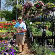 Kenny's Farm Stand and Florist logo