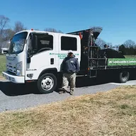 MT Landscaping and Lawncare logo