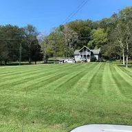 Lucky lawn Care & ground maintenance logo