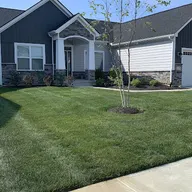Prime Time Lawn And Landscape logo