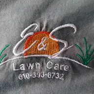 E & S Lawn Care logo