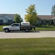 Quality Lawn Care & Snow Removal logo