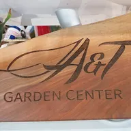 A & T Garden Center & Landscape Design logo