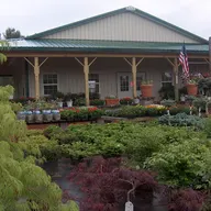 Lasnicki Landscaping & Nursery logo