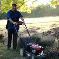 The lawnmower boys logo