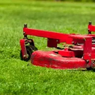Moore's Better Lawn Care logo